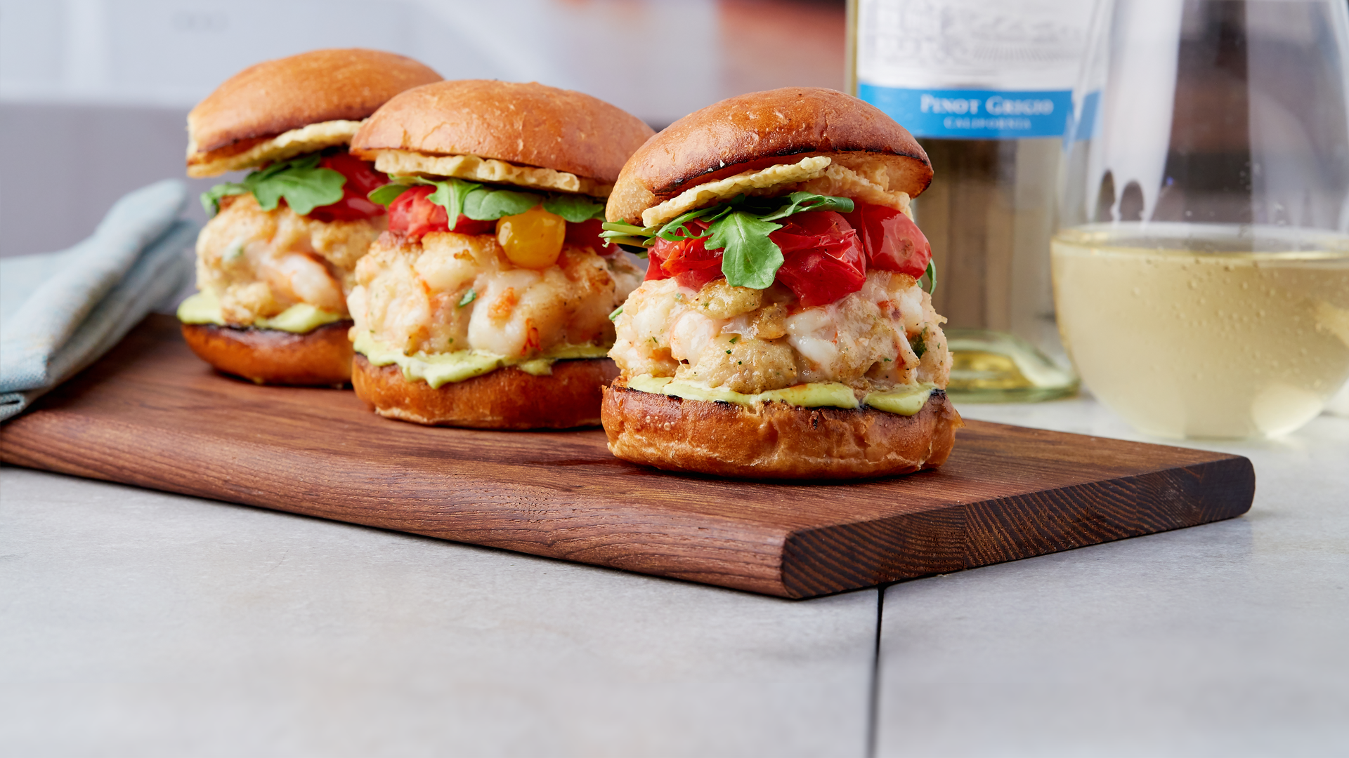 Scampi Prawn Sliders With Blistered Tomatoes And Lemon Pesto Aioli