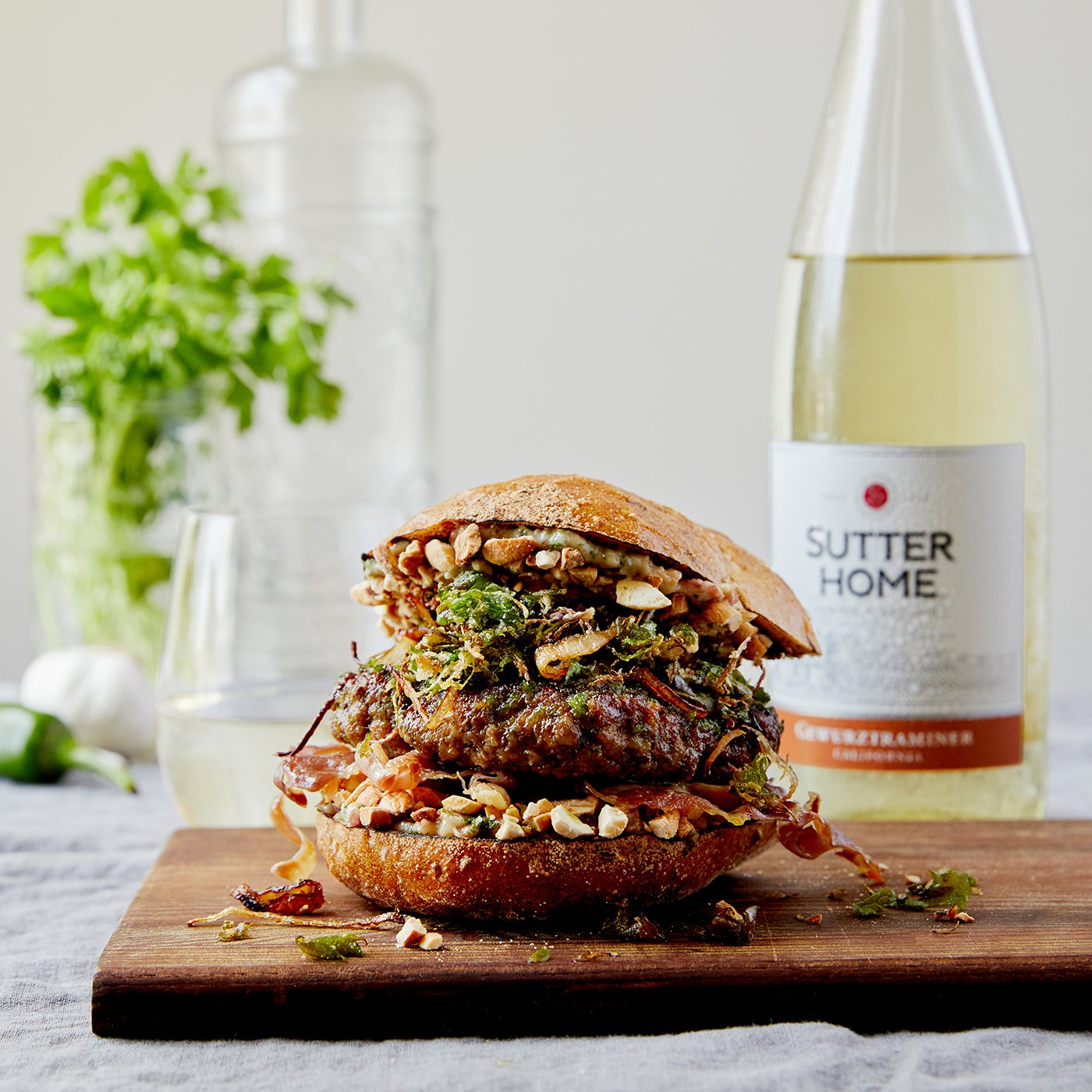 7 Train Caramelized Green Curry Burgers with Crispy Watercress Salad, Roasted Cashews, and Minted Basil Aioli