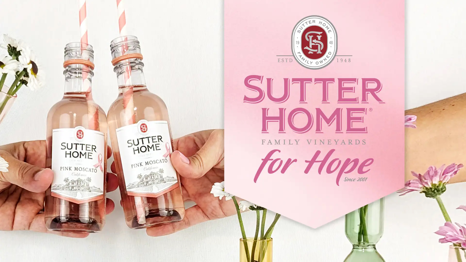 Two Sutter Home Pink Moscato mini bottles being held by hands in the left area of the image, with the Sutter Home for Hope badge graphic in the right area of the image, with flowers in vases behind the badge